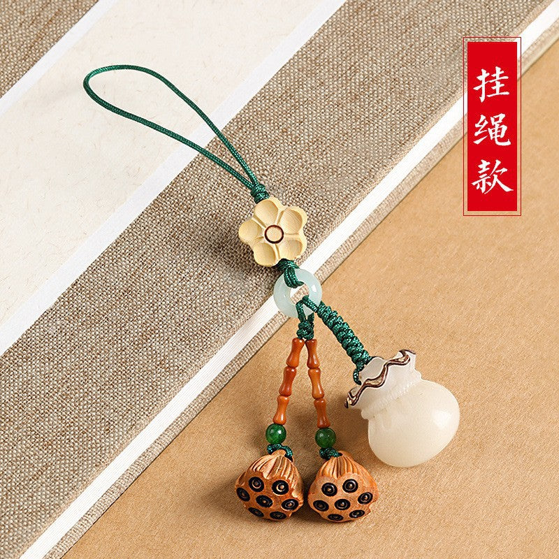 Wholesale Imitation Bodhi root blessing bag keychain peach wood lotus cute mobile phone chain