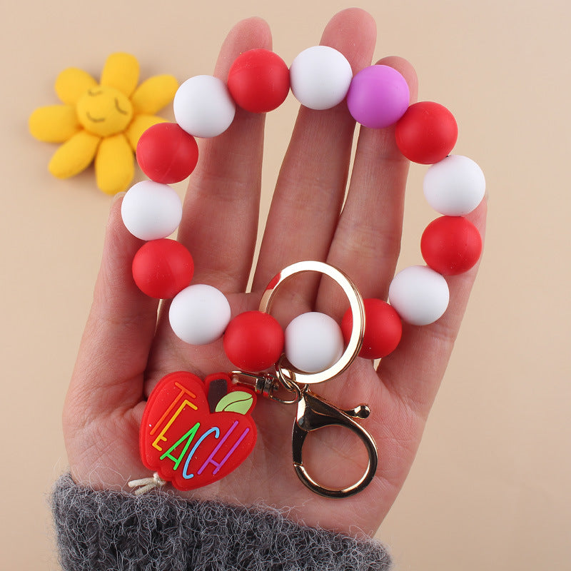 Wholesale Cartoon Apple Teacher Pencil Silicone Beaded Wrist Keychain
