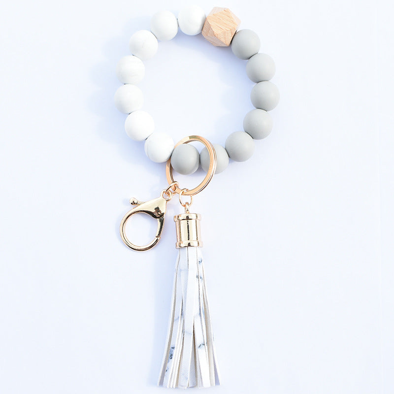 Wholesale Food Grade Silicone Beads Leather Tassel Wood Beads Bracelet Keychain