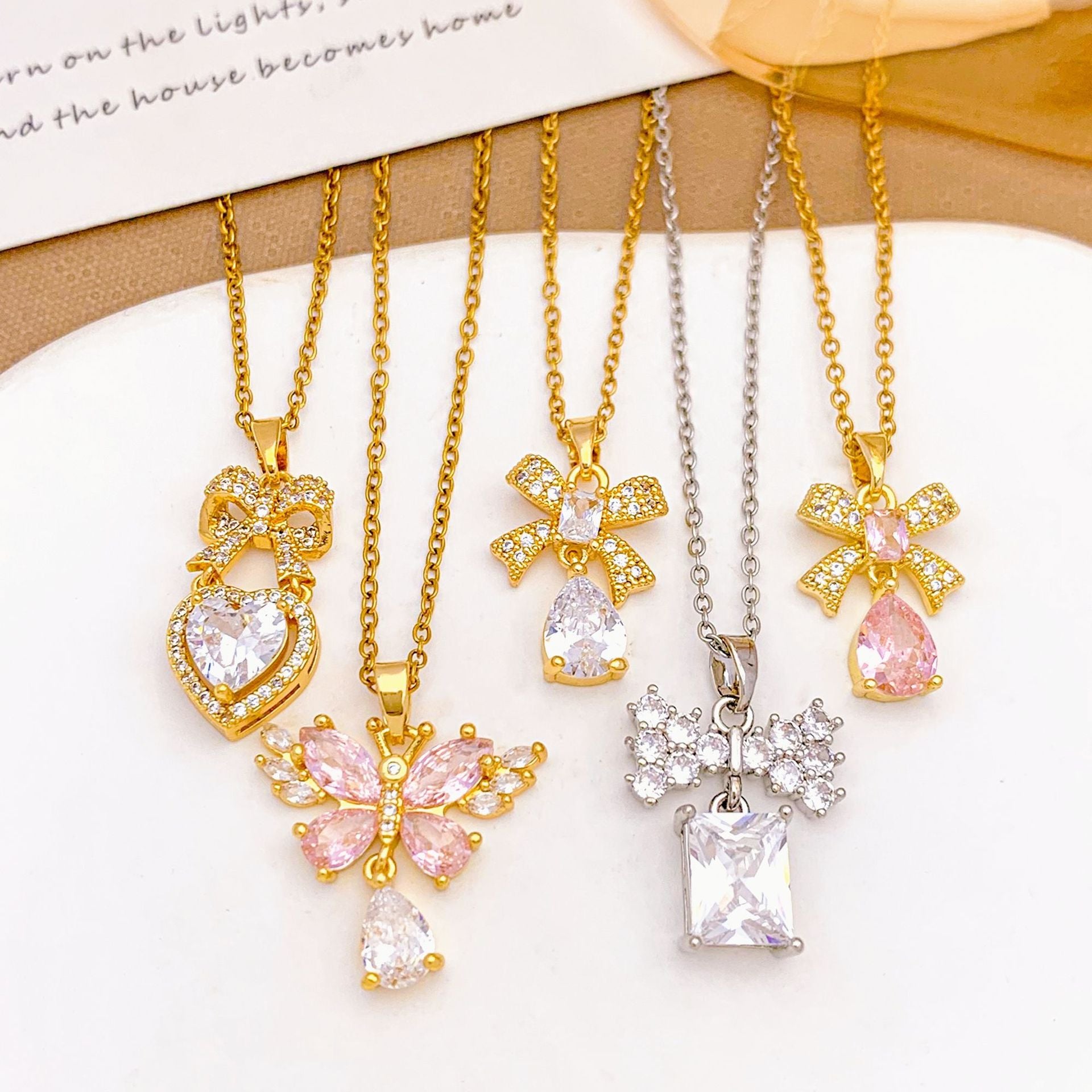 Wholesale Pink heart-shaped bow with diamond studded titanium steel necklace