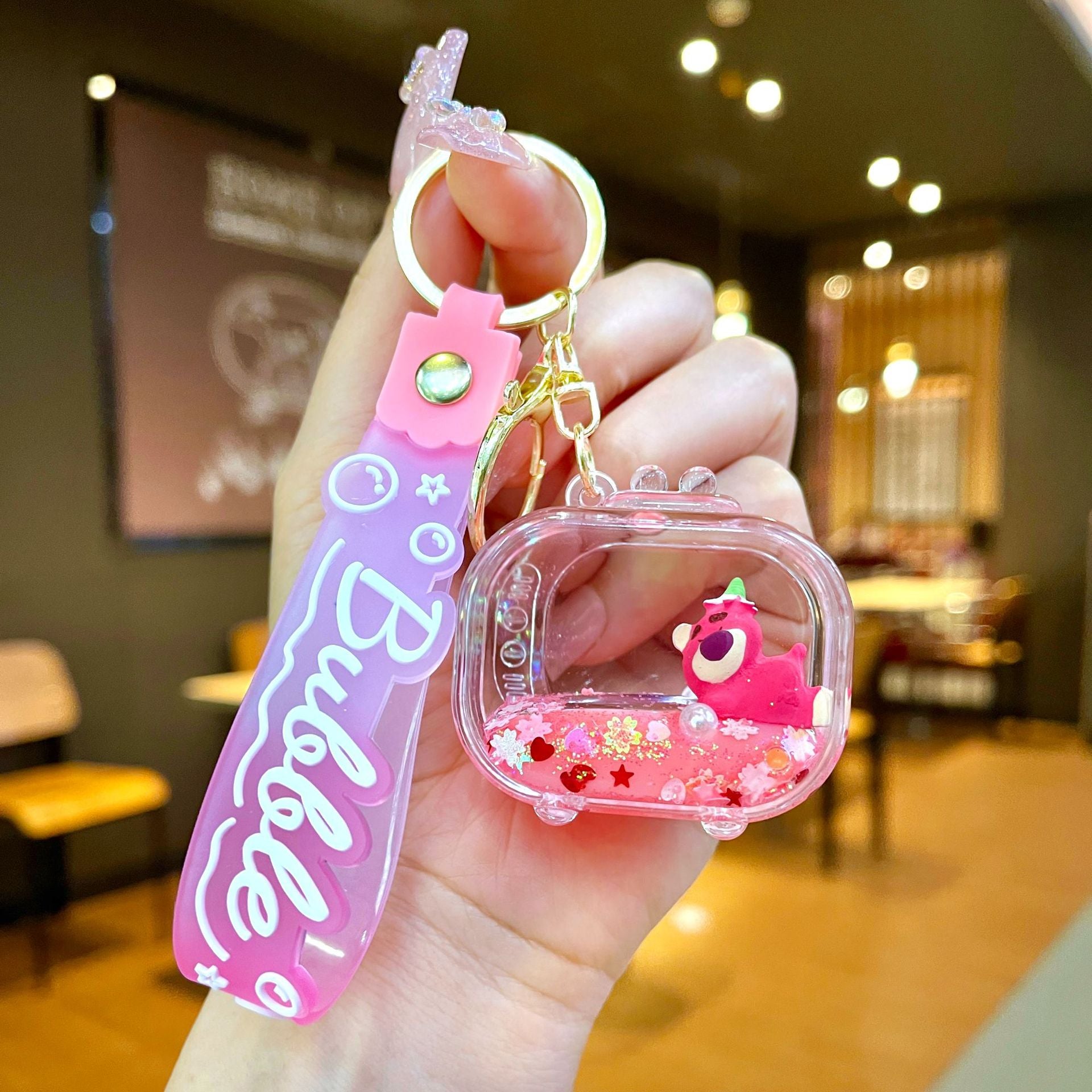 Wholesale Oil filled pink strawberry bear quicksand Keychains