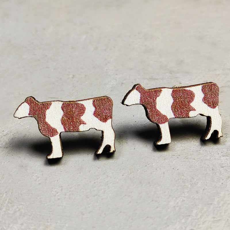 2 pares al por mayor/paquete Lightning Lightning Bull Head Coss Pendientes