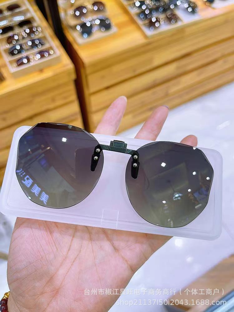 Wholesale Flip-up frameless round UV-proof sunglasses