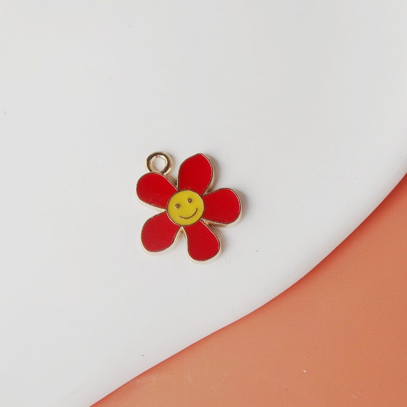 Wholesale smiley face flower oil drop alloy accessories Pendant
