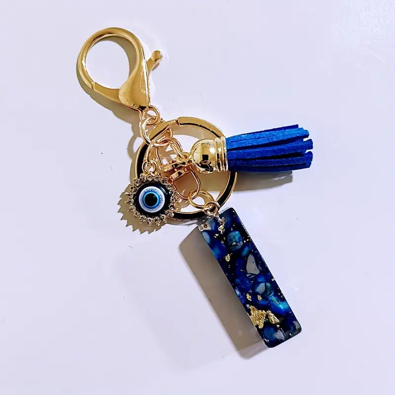 Wholesale Blue English letter Evil Eye tassel keychain