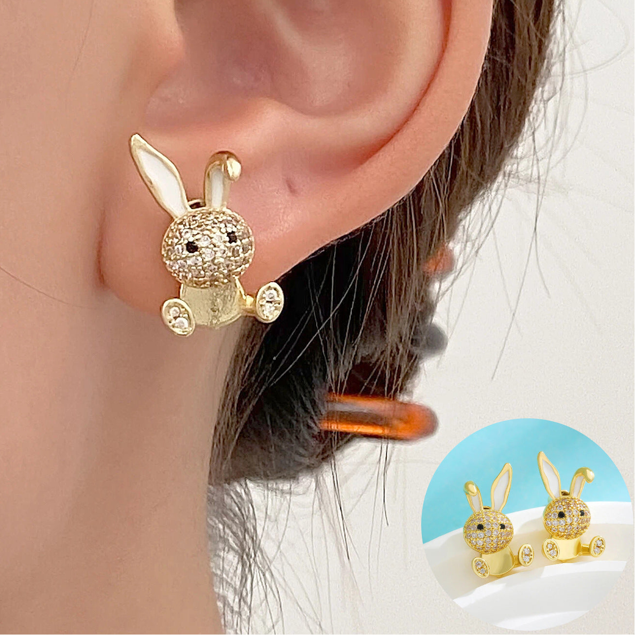 Wholesale Easter hollow asymmetrical white rabbit stainless steel earrings