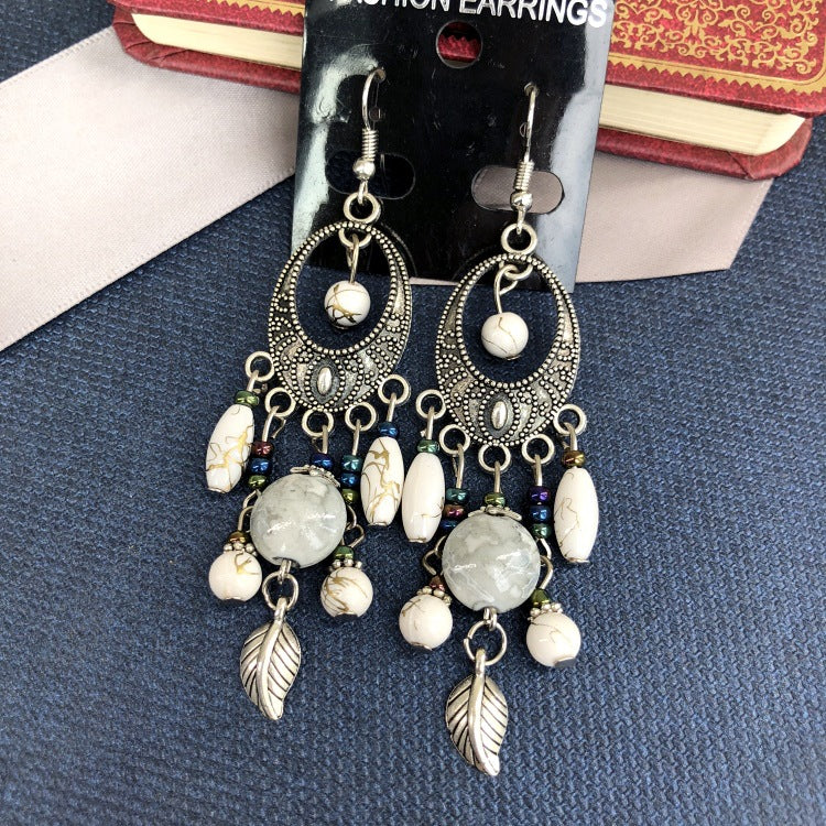 Wholesale Bohemian Retro Ethnic Style Ancient Silver Goddess Jewelry Face Skinny Tassel Long Earrings