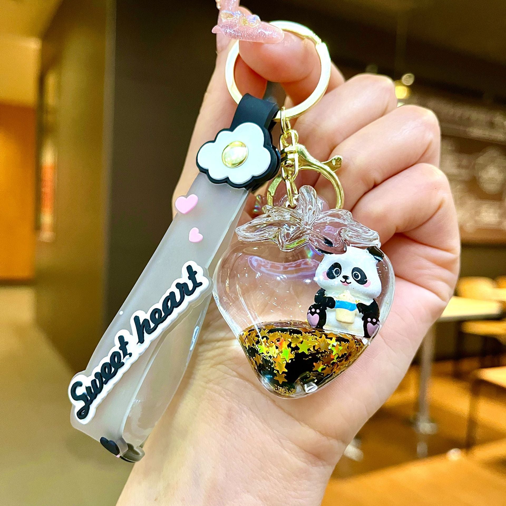 Wholesale Black gold floating cartoon cute panda Liquid Keychains