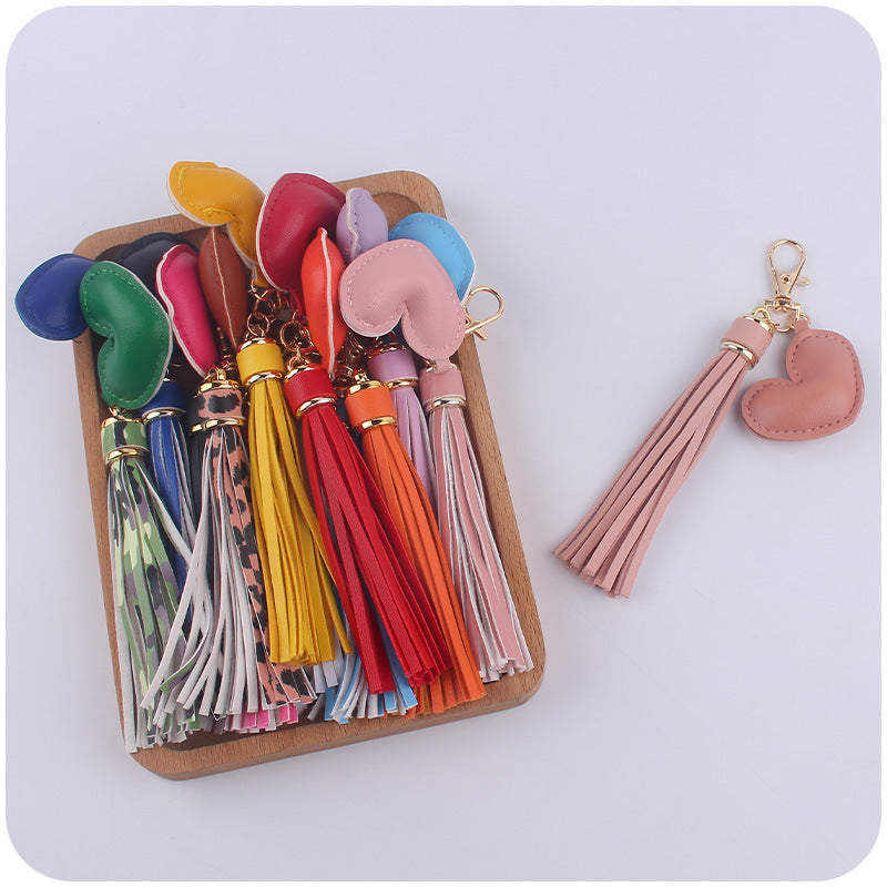 Llavero de borla de cuero de corazón al por mayor