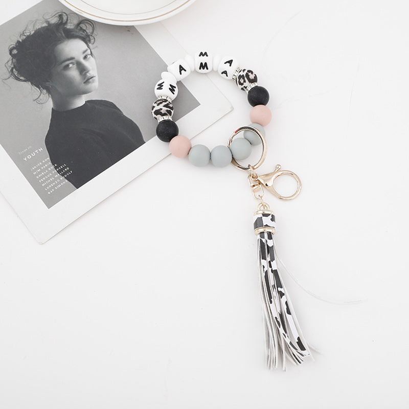 Wholesale 10PCS Silicone Bead Bracelets with Tassel Wood Beads Keychains