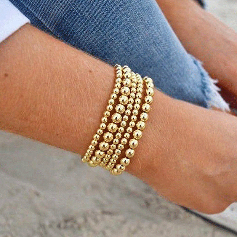 Wholesale beaded gold bracelet men's and women's color-retaining gold-plated elastic multi-layer stacked round bead bracelet bracelet