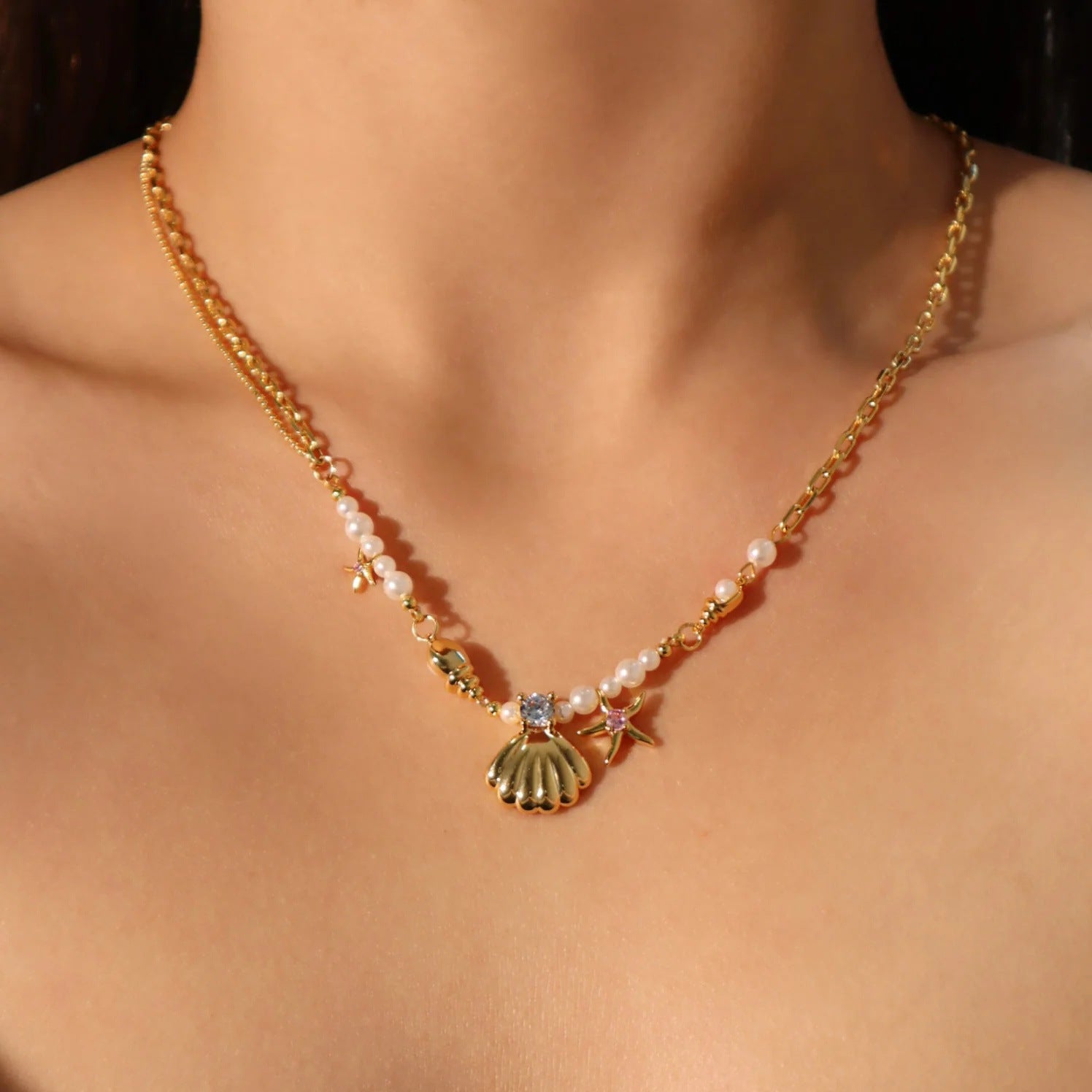 Wholesale Pearl Rice Pearl Star Mang Zircon Sea Star Shell Titanium Steel Necklace
