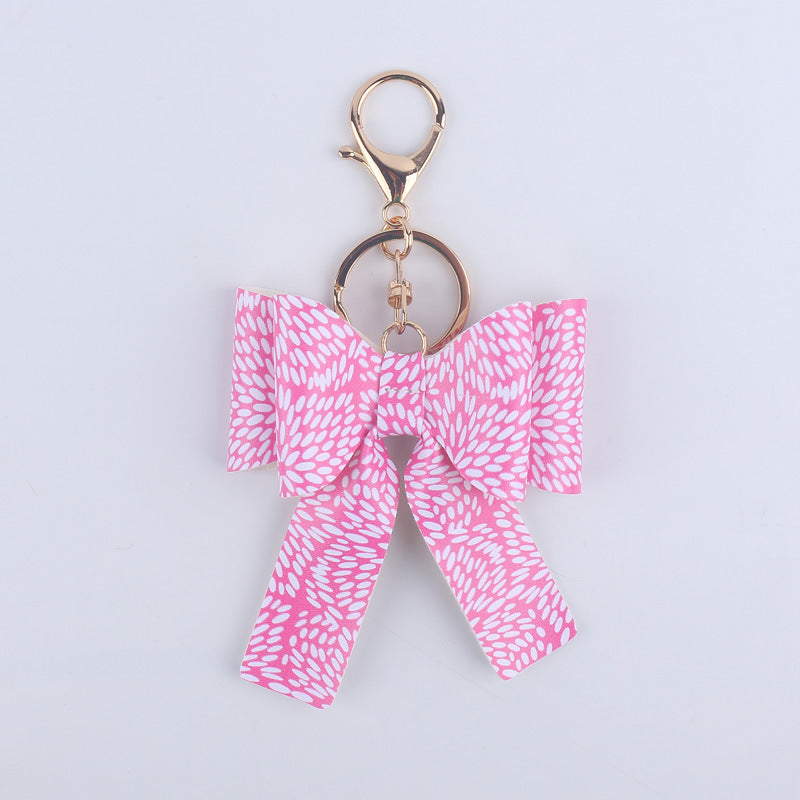 Wholesale Cartoon Aztec Color Bow Leather Keychain