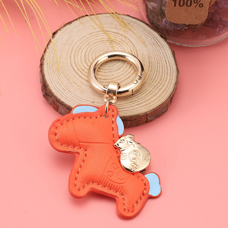 Wholesale Immediately get rich handmade cow leather car keychain pendant