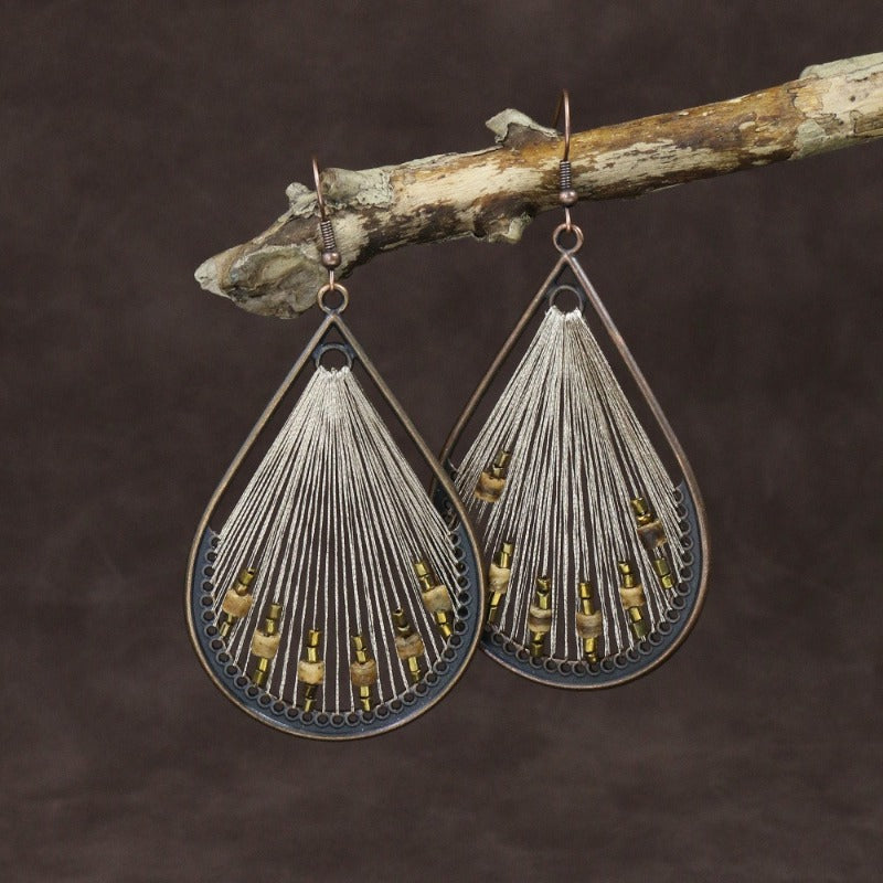 Wholesale Bohemian Rice Pearl Shell Long Tassel Earrings