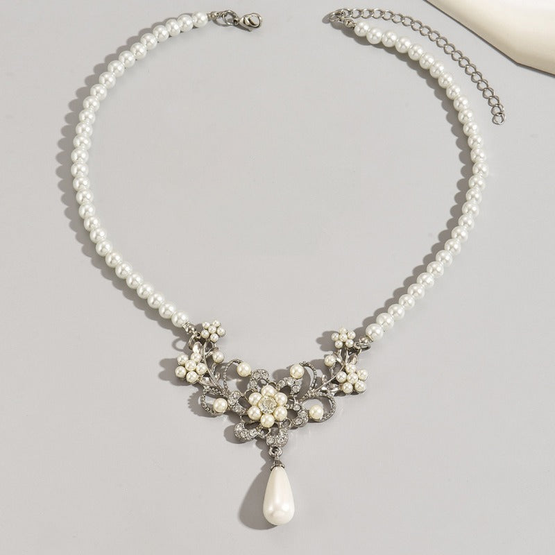 Wholesale Retro Atmospheric Style Pearl Inlaid Zircon Plum Blossom Design Earrings and Necklace Set