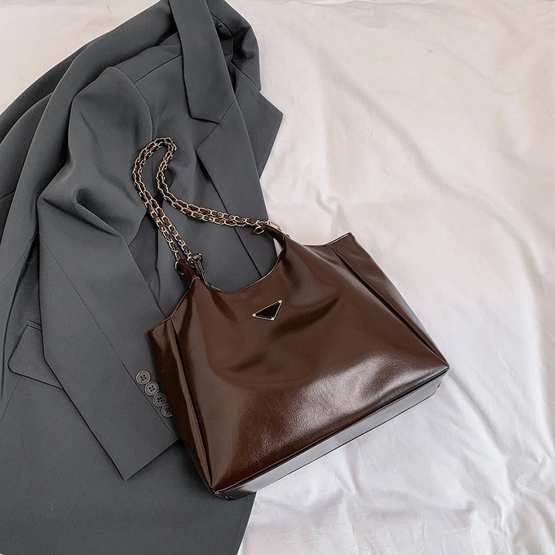 Wholesale synthetic leather shoulder armpit bag commuting large bag women's fashion tote bag class bag