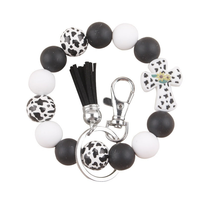 Wholesale Silicone Leather Wooden Beads Tassel Print Leopard Bracelet Keychain