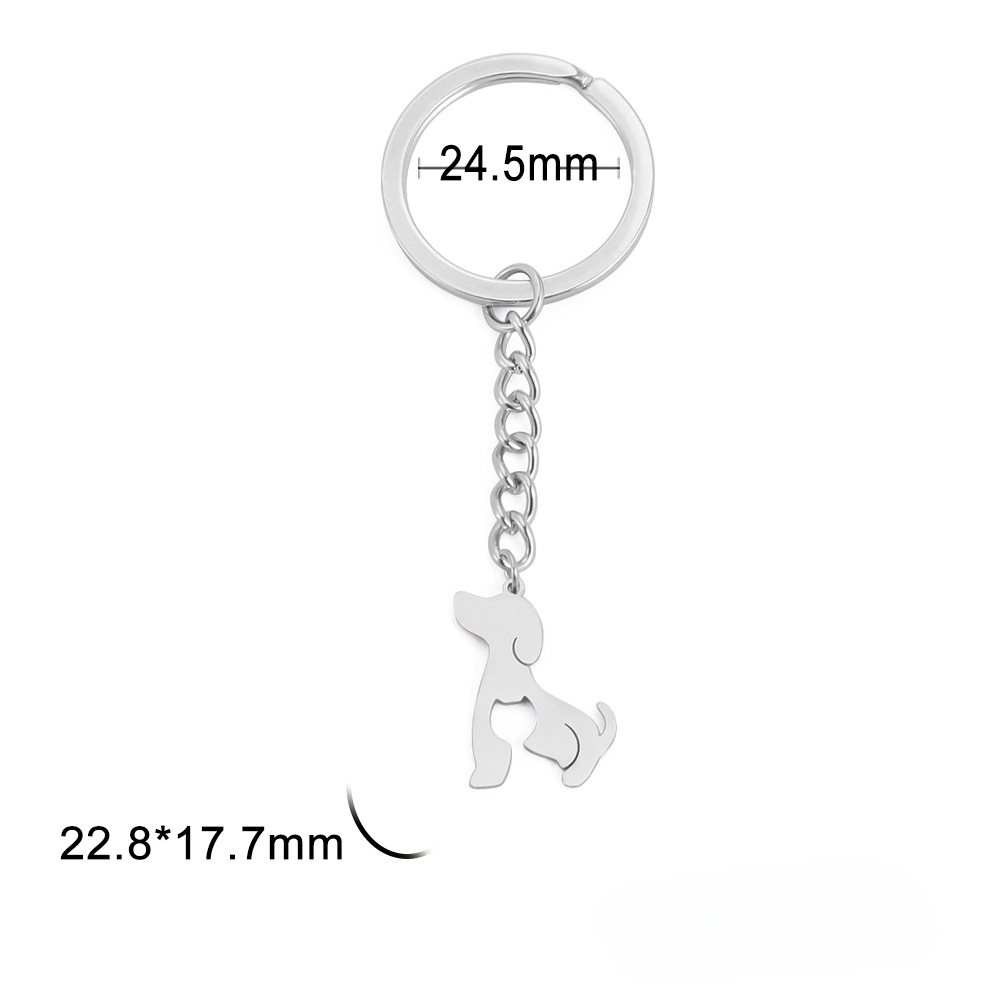 Titanio de titanio al por mayor Hollow Dog Cat Keychain