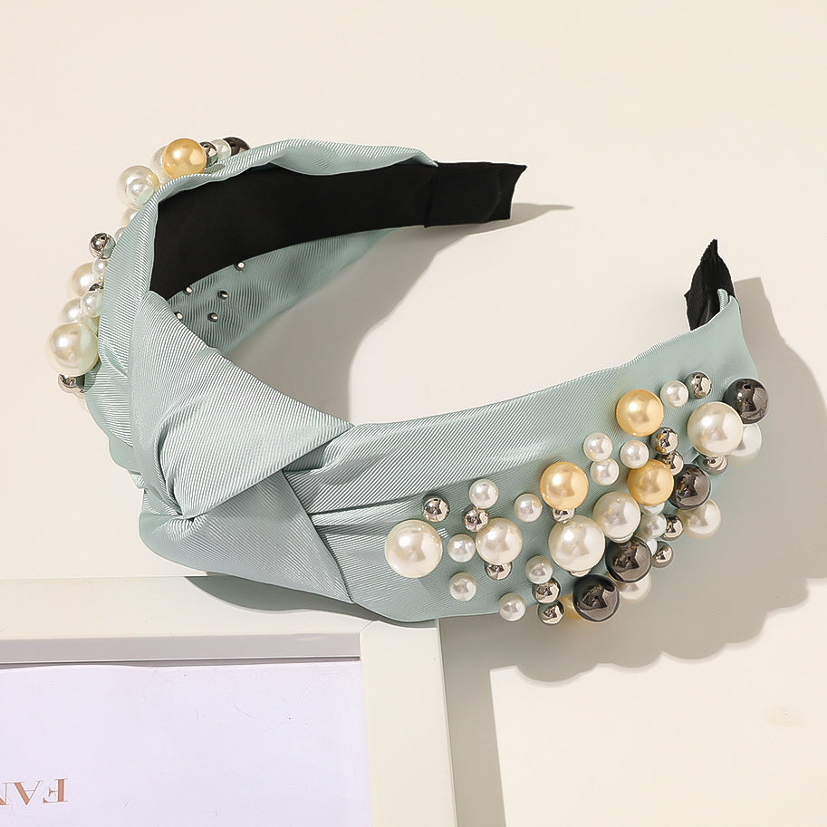 Wholesale of New Pearl Knotted Wide Edged PU Hair Bands