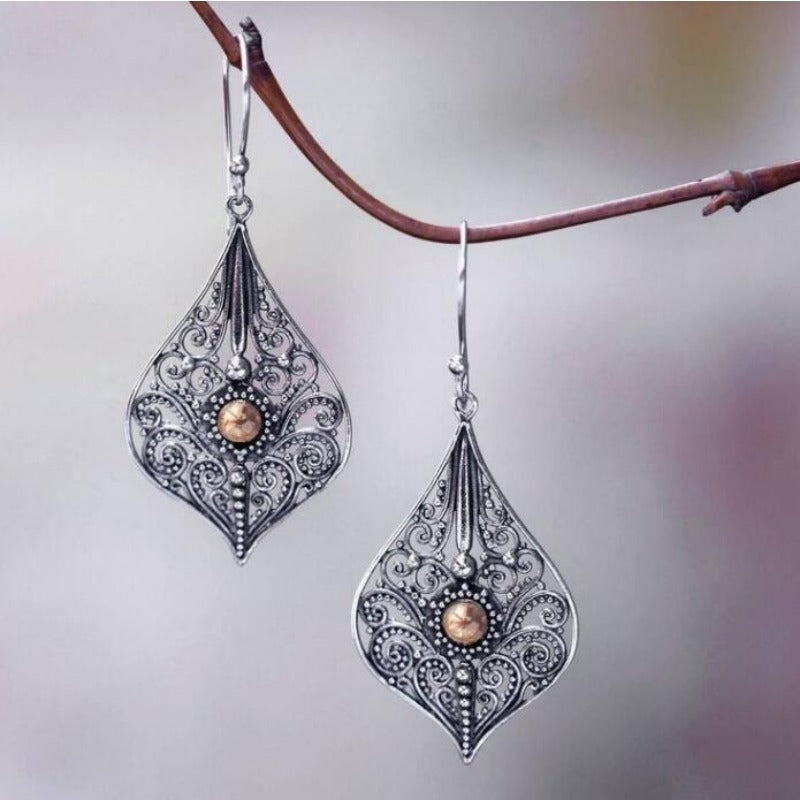 Wholesale Bohemian Retro Style Teardrop-shaped Hollow Pattern Inlaid Gem Alloy Earrings