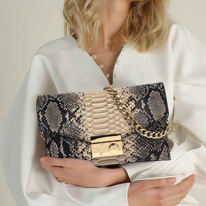 Wholesale One Shoulder Retro Simple Flip Up Serpentine Handbag