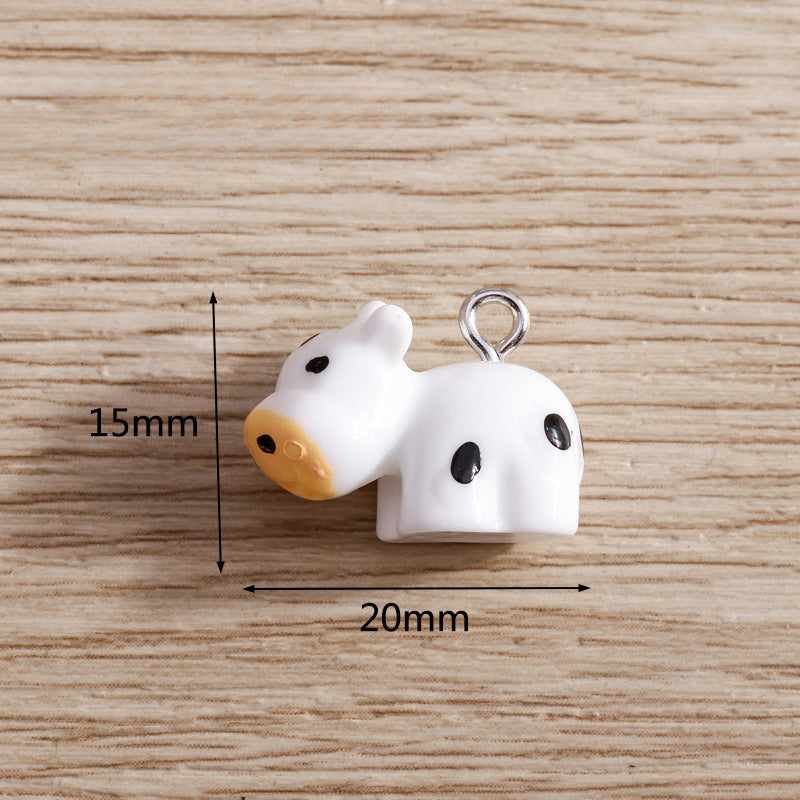 Wholesale 10 PCS/PACK of Cartoon Cow Resin Accessories DIY Keychain Jewelry Pendant