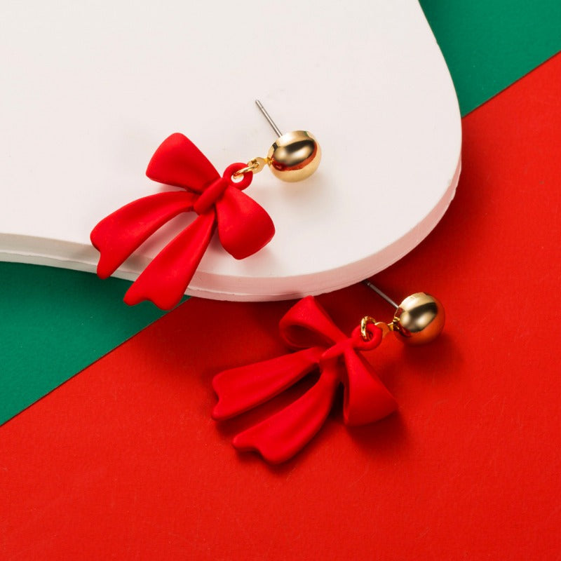 Wholesale Christmas Holiday Personality Simple Bell Bow Asymmetric Alloy Oil Drop Earrings