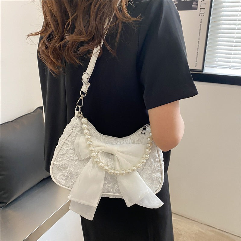 Wholesale Retro Bowknot Fashion Pearl Underarm Shoulder Crossbody Bag