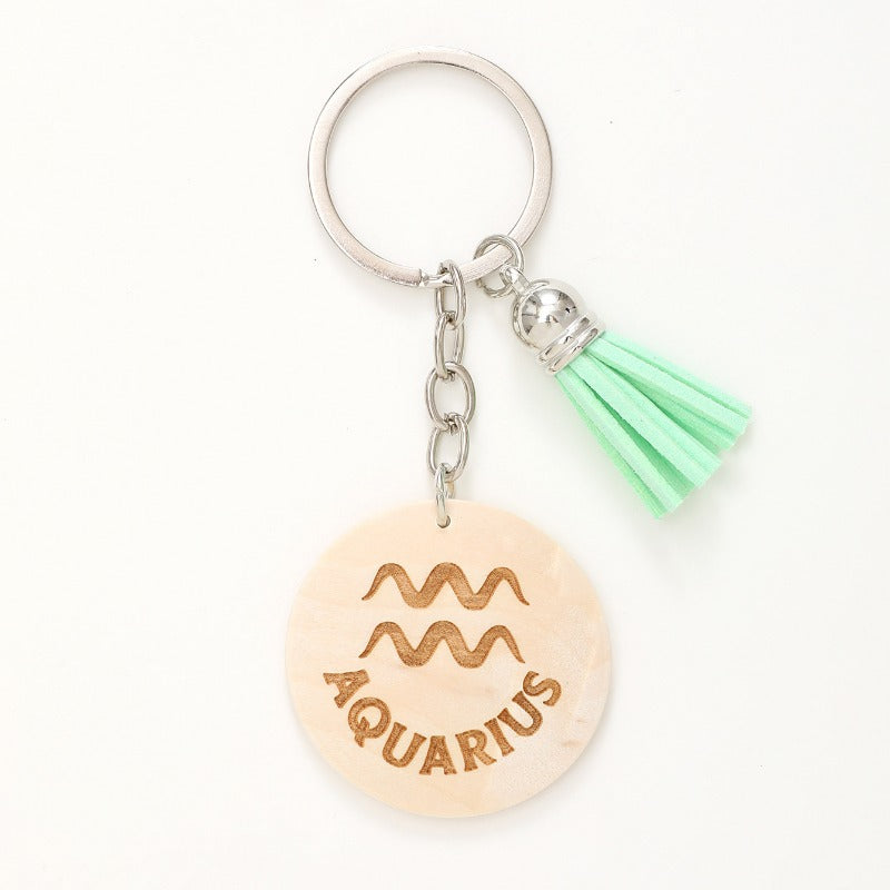 Wholesale Simple Style Wooden Round Twelve Constellation Letter Pattern Tassel Keychain
