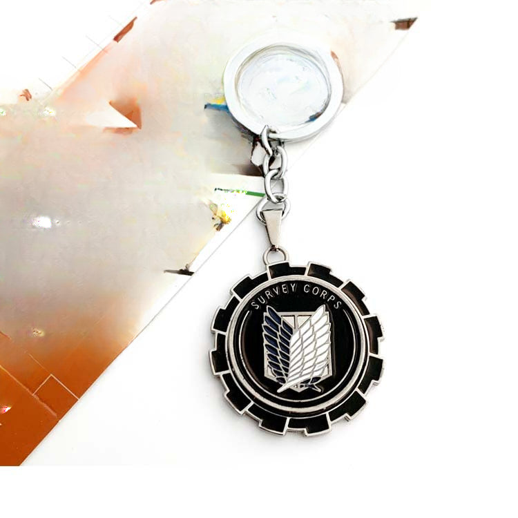 Wholesale Chain Skull Logo Rotatable Alloy Keychain