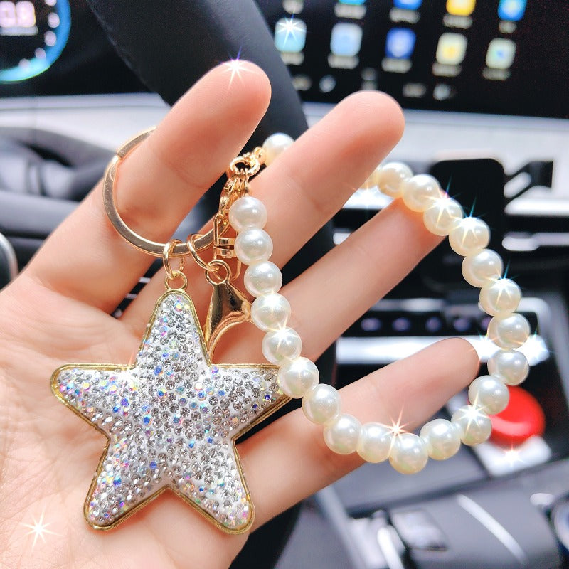 Wholesale Diamond Five-pointed Star Pearl Car Metal Creative Bag Pendant Keychains