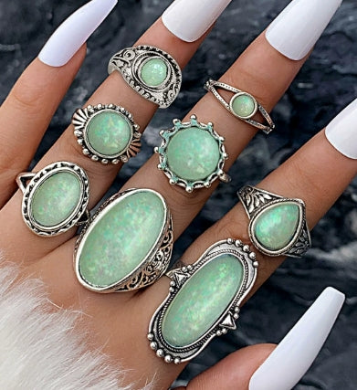 Vintage 8-piece Ring Set with Turquoise Carved Feathers