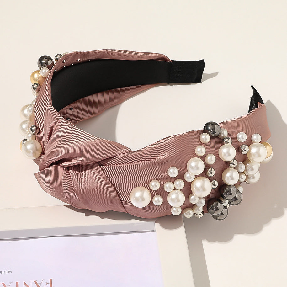 Wholesale of New Pearl Knotted Wide Edged PU Hair Bands