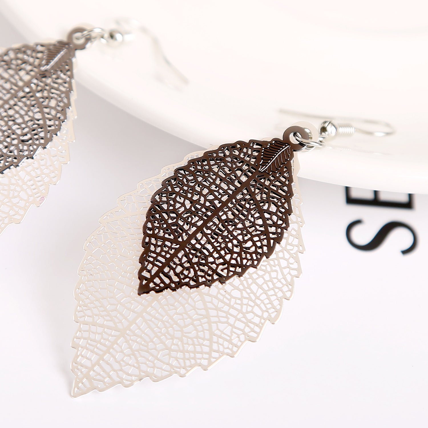 Wholesale Gold Double Hollow Leaf Alloy Earrings