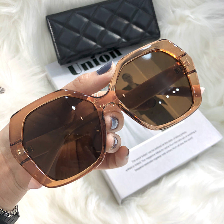 Venta al por mayor, gafas de sol transparentes para mujer con marco grande y personalidad