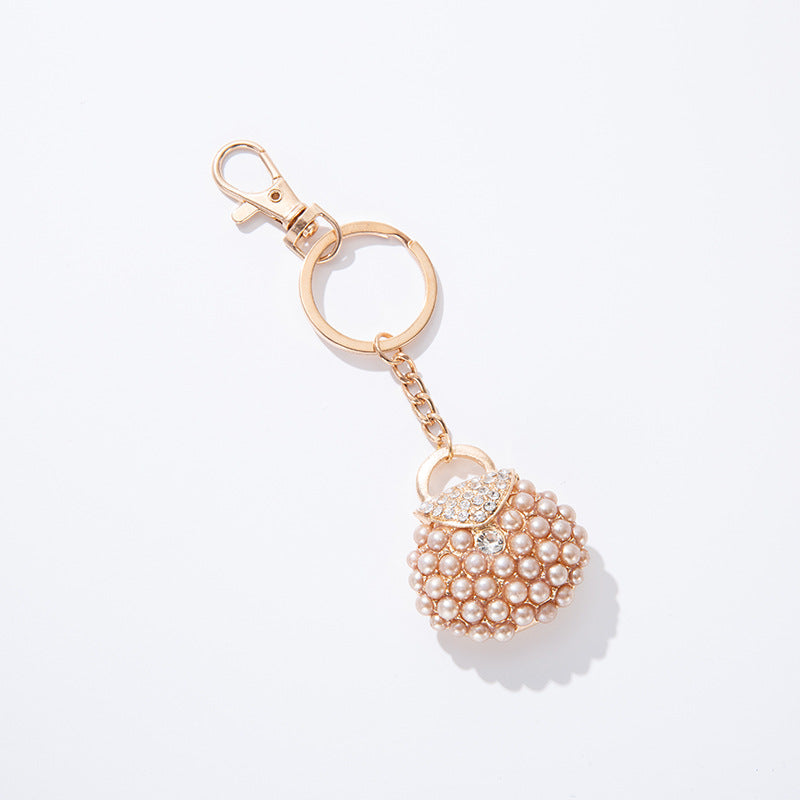 Llavero de bolsa de perlas de diamantes de aleación al por mayor