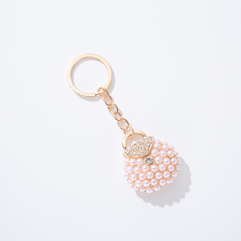 Llavero de bolsa de perlas de diamantes de aleación al por mayor