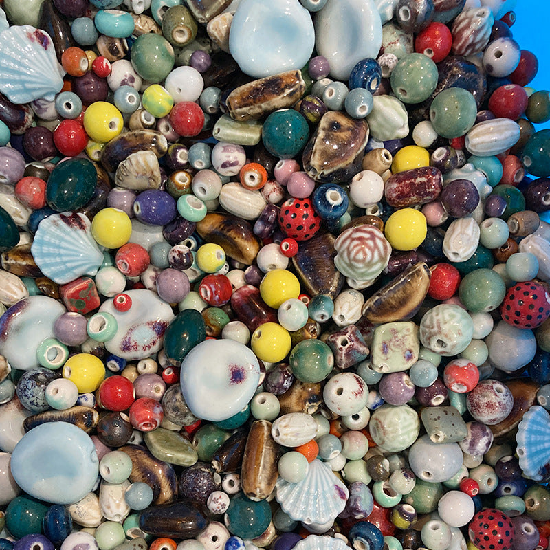 Al por mayor una Catty 4cm*10cm*3cm en forma de cuentas de cerámica