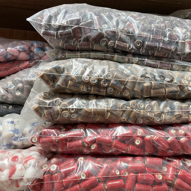 Al por mayor una Catty 4cm*10cm*3cm en forma de cuentas de cerámica