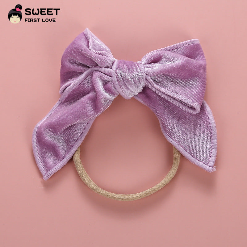 Venda al por mayor lazo elástico del pelo del tocado del arco del terciopelo