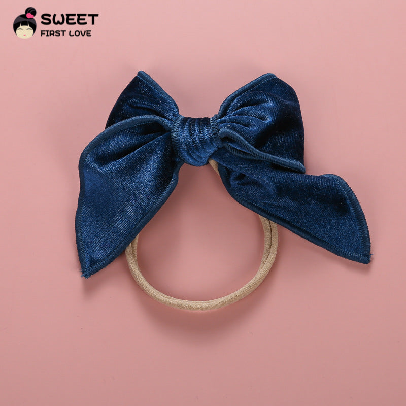 Venda al por mayor lazo elástico del pelo del tocado del arco del terciopelo