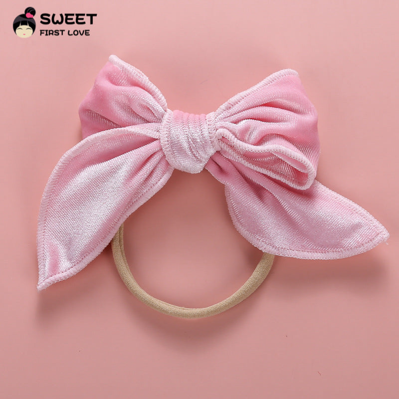 Venda al por mayor lazo elástico del pelo del tocado del arco del terciopelo