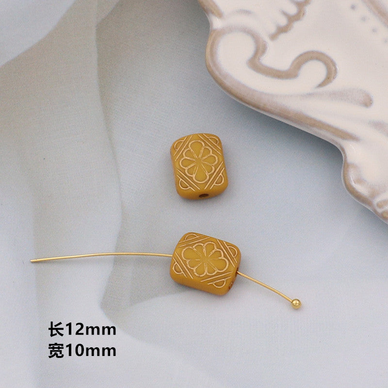 Wholesale of 10PCS Vintage Gold Relief Patterned Plastic Beads
