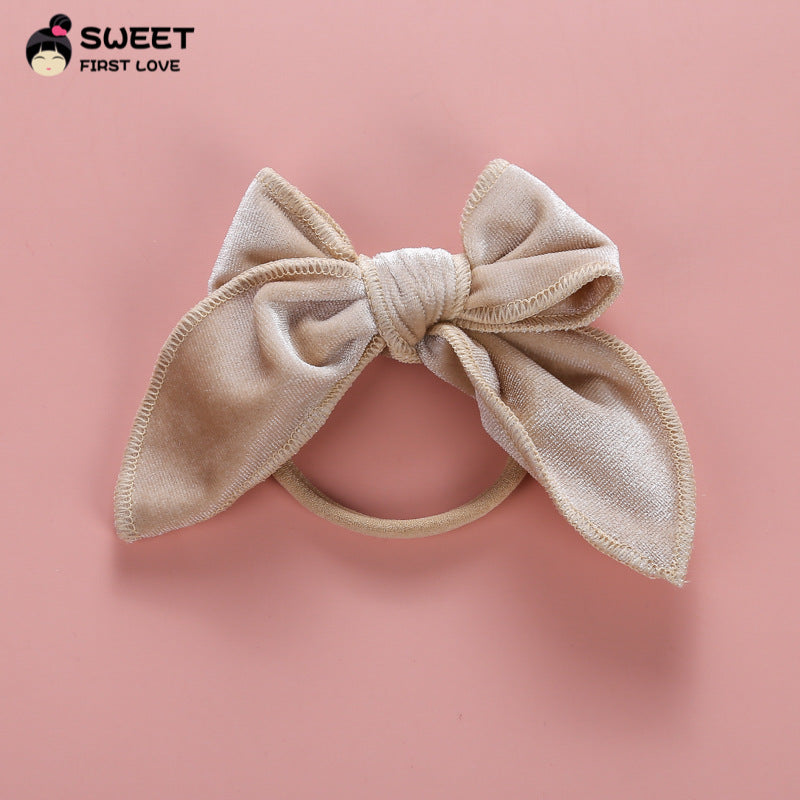 Venda al por mayor lazo elástico del pelo del tocado del arco del terciopelo