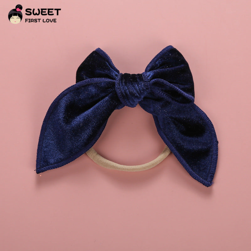 Venda al por mayor lazo elástico del pelo del tocado del arco del terciopelo