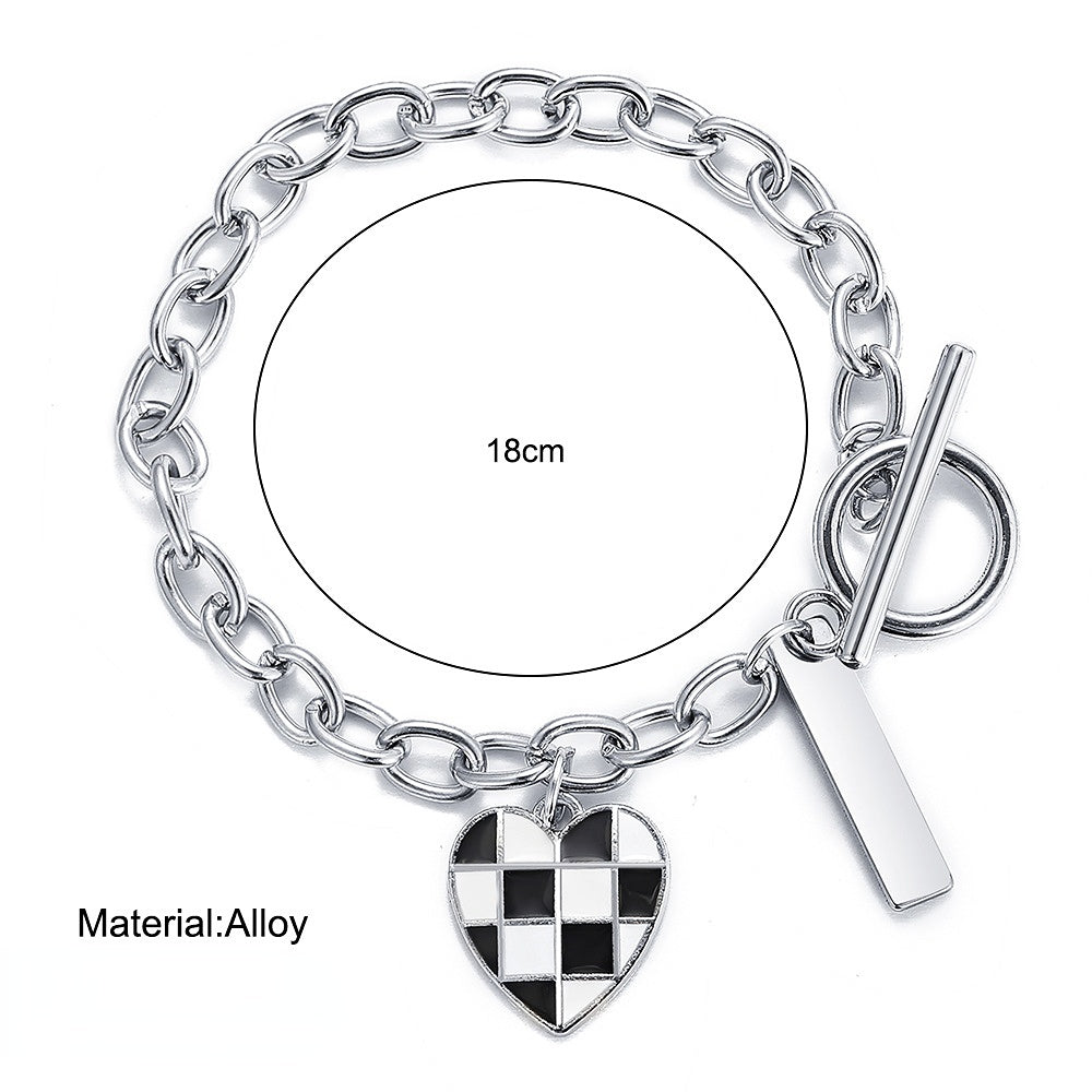 Pulsera de aleación de corazón de tablero de ajedrez blanco y negro al por mayor
