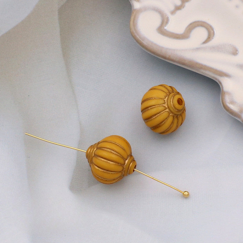 Wholesale of 10PCS Vintage Gold Relief Patterned Plastic Beads