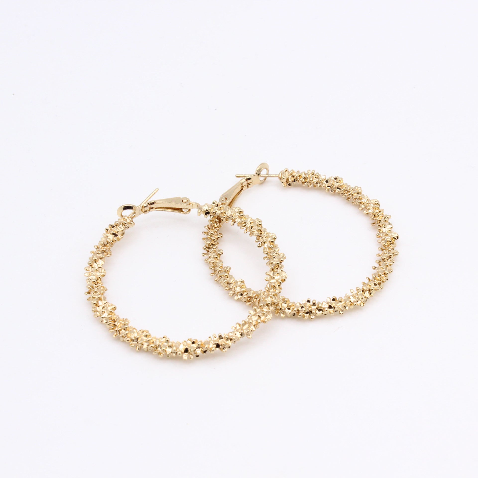 Wholesale Irregular Pimple Circle Alloy Earrings