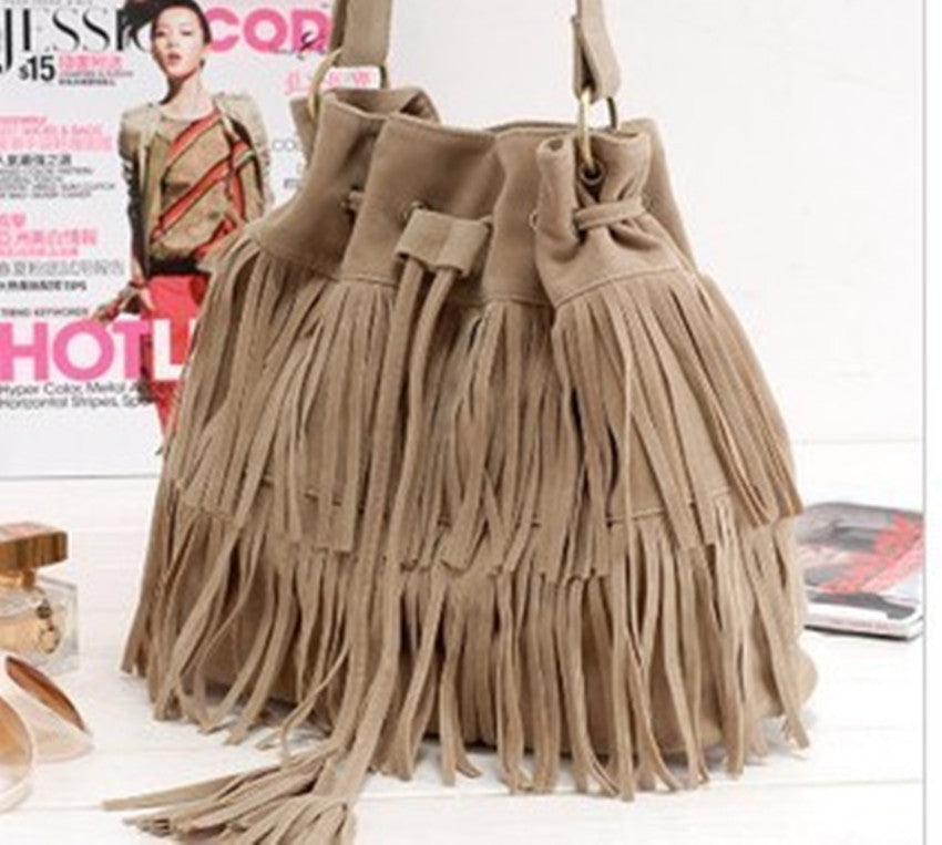 Venta al por mayor Bolso de hombro con borla esmerilada PU